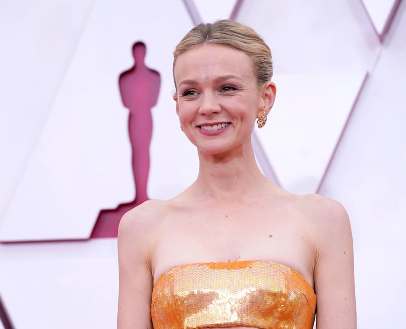 epa09160502 Carey Mulligan arrives for the 93rd annual Academy Awards ceremony at Union Station in Los Angeles, California, USA, 25 April 2021. The Oscars are presented for outstanding individual or collective efforts in filmmaking in 24 categories. The Oscars happen two months later than originally planned, due to the impact of the coronavirus COVID-19 pandemic on cinema.  EPA/Chris Pizzello / POOL *** Local Caption *** 55864152