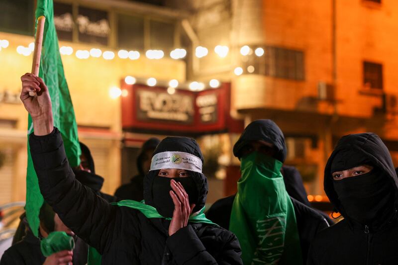 Hamas supporters in Hebron, West Bank, protest on January 2 against the Israeli strike in Lebanon that killed Al Arouri. AFP