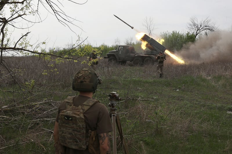 Ukrainian soldiers fire at Russian positions near the town of Kupyansk, Kharkiv Region. AFP
