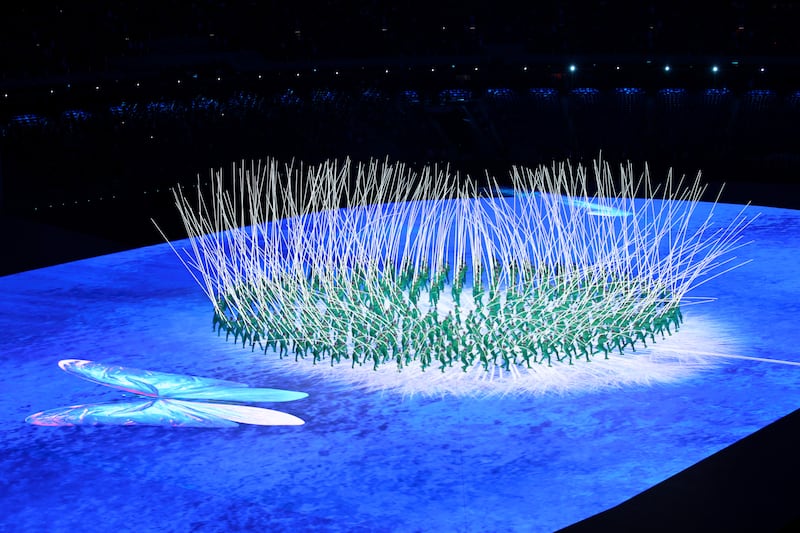 Performers create a flower display with LED lights during the opening ceremony of the Beijing 2022 Winter Olympics at the Beijing National Stadium on Friday, February 04, 2022. Getty