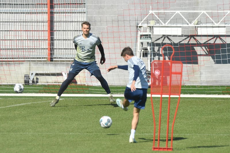 Thomas Mueller with goalkeeper Manuel Neuer during a training session on Monday. Getty