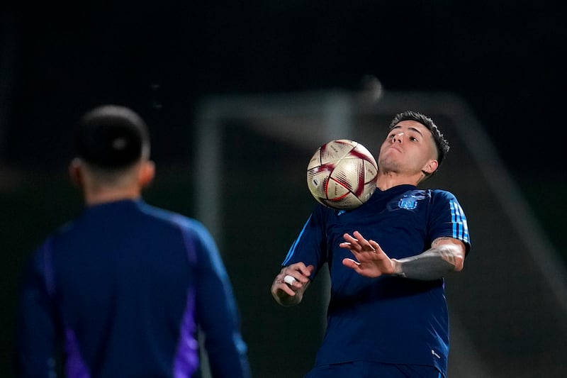 Argentina's Enzo Fernandez controls a ball during training. AP
