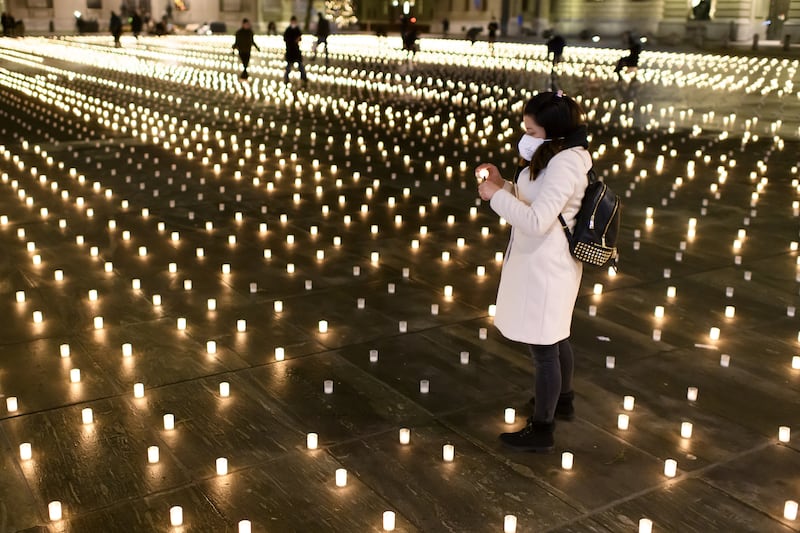 Activists lit about 12,000 candles in Bern, Switzerland, in memory of the people who have died from Covid-19 in the country. EPA