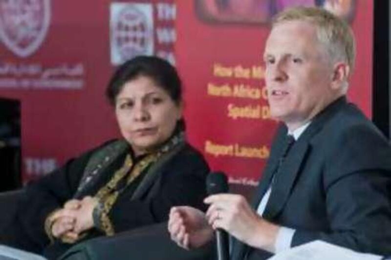 Ms. Shamshad Akhtar, World Bank regional VP for Middle East and North Africa, looks on as Dr. Alex Kremer speaks at the launch of his book  "How the Middle East and North Africa can rise above spatial disparities in Dubai, United Arab Emirates on Tuesday, June 15, 2010. Photo: Charles Crowell fir The National