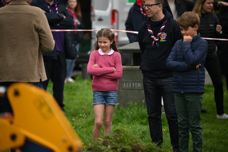The young royals watch on as a Big Help Out event takes place in Slough. Getty