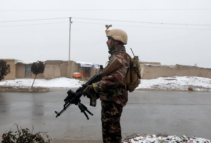An Afghan security force member stands guard near the site of an attack at the Marshal Fahim military academy in Kabul, Afghanistan January 29, 2018. REUTERS/Omar Sobhani