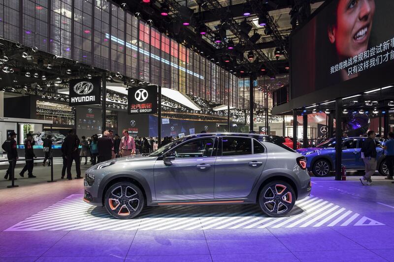 A Lynk & Co. 02 crossover sport utility vehicle (SUV), manufactured by Geely Automobile Holdings Ltd., stands on display at the Beijing International Automotive Exhibition in Beijing, China, on Thursday, April 26, 2018. The Exhibition is a barometer of the state of the world’s biggest passenger-vehicle market. Photographer: Qilai Shen/Bloomberg