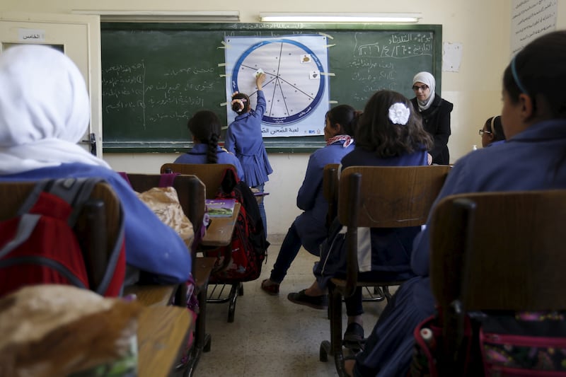 Pupils at a school in Irbid, Jordan. Some teachers in the country have taken jobs abroad, contributing to a widespread brain drain. Reuters