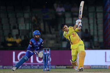 Chennai Super Kings captain MS Dhoni hits a six on his way to an unbeaten 32 in the win over Delhi Capitals. AP Photo