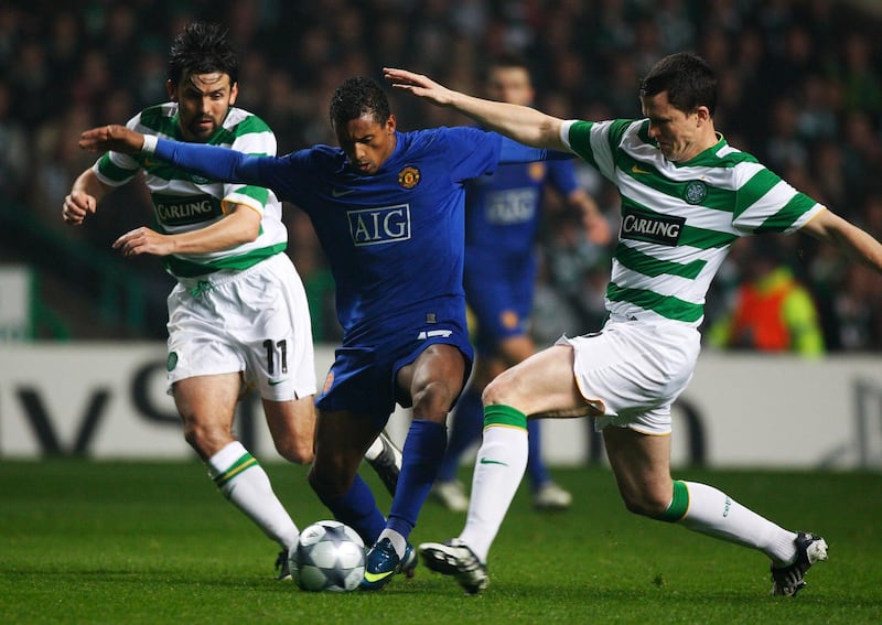 GLASGOW, UNITED KINGDOM - NOVEMBER 05:  Paul Hartley (L) and Gary Caldwell (R) of Celtic battle for the ball with Nani of Manchester United during the UEFA Champions League Group E match between Celtic and Manchester United at Parkhead on November 5, 2008 in Glasgow, Scotland.  (Photo by Jeff J Mitchell/Getty Images)