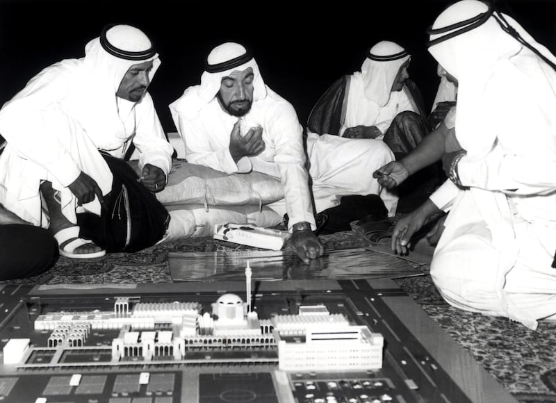 Sheikh Zayed reviews plans for Emirates University with Sheikh Hamdan bin Mohammed bin Khalifa Al Nahyan in 1974. National Archives
