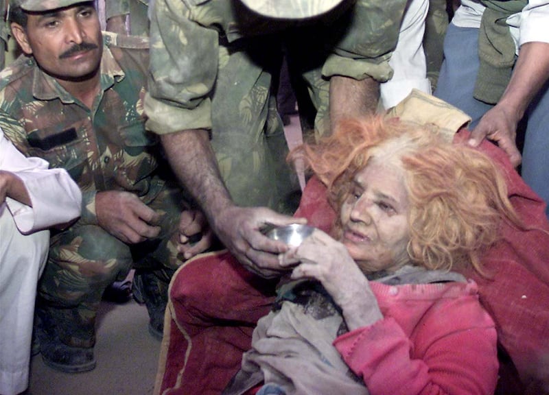 A 75-YEAR-OLD INDIAN WOMAN IS GIVEN TEA BY A SOLDIER AFTER SHE WAS PULLED OUT ALIVE FROM THE RUBBLE OF HER HOUSE, IN THE CITY OF BHUJ.


A 75-year-old Indian woman, Pokanaseri, is offered tea by a soldier after she was pulled out from the rubble of her home in the western Indian city of Bhuj January 27, 2001. Her house was destroyed by a massive earthquake,which struck the western Indian state of Gujarat on Friday, killing as many as 15,000 people.