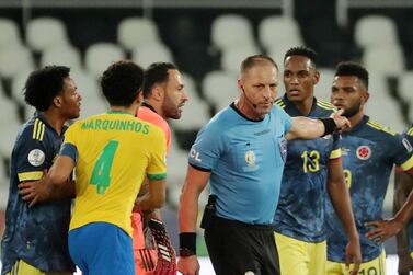  Colombia players remonstrate with referee Nestor Pitana after a Brazil goal. Reuters