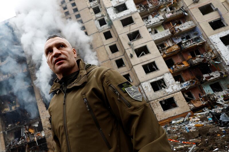 Kyiv Mayor Vitali Klitschko visits a residential building damaged during a Russian missile attack in Kyiv. Reuters