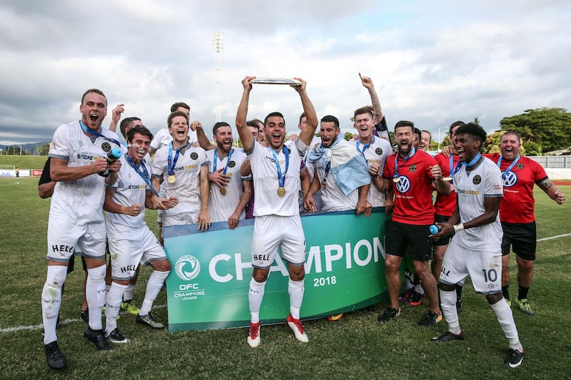 Team Wellington players celebrate winning the Oceania Champions League on Sunday. Handout image