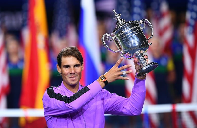 Rafael Nadal of Spain holds the trohpy after his win over Daniil Medvedev of Russia during the men's Singles Finals match at the 2019 US Open at the USTA Billie Jean King National Tennis Center in New York on September 8, 2019. / AFP / Johannes EISELE
