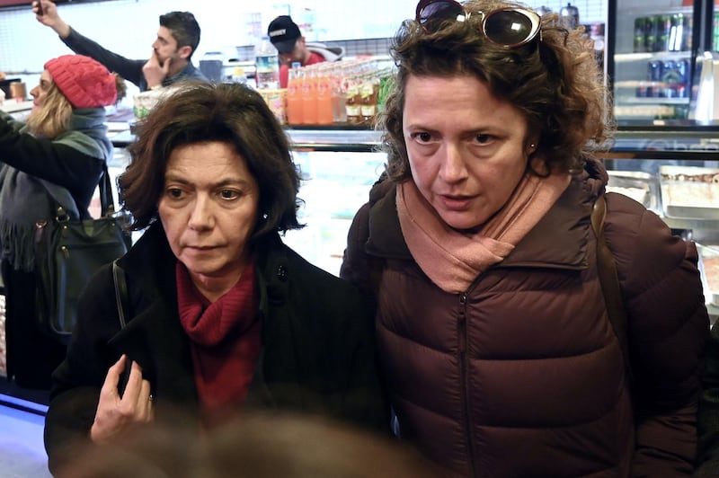 Turkish sociologist Ayse Bugra (L), wife of Turkish leading businessman and  rights defender Osman Kavala, reacts after Istanbul prosecutors issued a new arrest warrant for Kavala, as part of a separate probe after his acquittal earlier in the day.  AFP