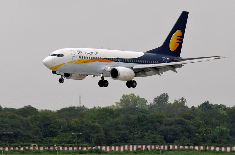 FILE PHOTO - A Jet Airways passenger aircraft prepares to land at the airport in the western Indian city of Ahmedabad August 12, 2013.  REUTERS/Amit Dave/File Photo   GLOBAL BUSINESS WEEK AHEAD