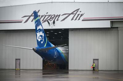 The Alaska Airlines 737 Max 9 that made an emergency landing when it lost part of its fuselage is seen grounded in a hangar at Portland International Airport on Tuesday. AFP