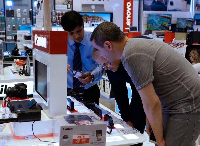 Dubai, United Arab Emirates - March 26, 2017.  Value Added Tax will affect electronic items such as these digital cameras, at Jacky's Electronics shop in Dubai mall.  ( Jeffrey E Biteng / The National )  Editor's Note; ID 90307  *** Local Caption ***  JB260317-VAT11.jpg