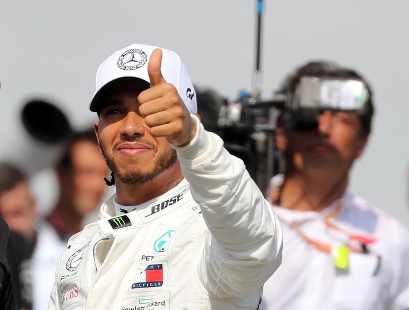 Mercedes' British driver Lewis Hamilton celebrates winning the qualifying session of the German Formula One Grand Prix at the Hockenheim racing circuit on July 27, 2019 in Hockenheim, southern Germany.  Germany OUT
 / AFP / dpa / Jan Woitas
