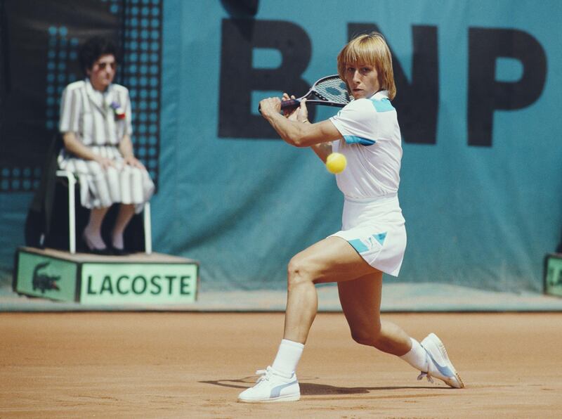 Martina Navratilova of the United States makes a backhand return against Chris Evert during their Women's Singles Final match at the French Open Tennis Championship on 9 June 1984 at the Stade Roland Garros Stadium in Paris, France. (Photo by Steve Powell/Allsport/Getty Images)