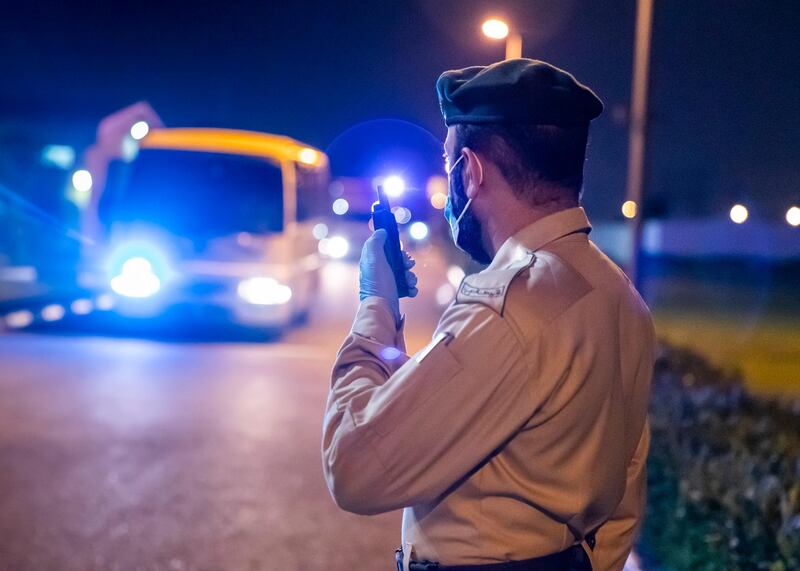 DUBAI, UNITED ARAB EMIRATES. 16 APRIL 2020. 
Dubai Mounted Police officers, in Al Aweer, about to drive to patrol residential and commercial areas to insure residents are staying safe indoors during COVID-19 lockdown. They patrol the streets from 6PM to 6AM.

The officers of the Dubai Mounted Police unit have been playing a multifaceted role in the emirate for over four decades. 

The department was established in 1976 with seven horses, five riders and four horse groomers. Today it has more than 130 Arabian and Anglo-Arabian horses, 75 riders and 45 groomers.

All of the horses are former racehorses who went through a rigorous three-month-training programme before joining the police force. Currently, the department has two stables – one in Al Aweer, that houses at least 100 horses, and the other in Al Qusais, that houses 30 horses.

(Photo: Reem Mohammed/The National)

Reporter:
Section: