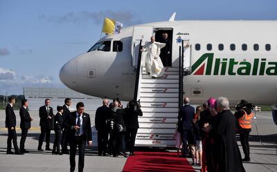 Pope Francis disembarks from the plane on his arrival at Dublin International Airport on August 25, 2018, at the start of his visit to Ireland to attend the 2018 World Meeting of Families. (Photo by Charles McQuillan / POOL / Getty Images)