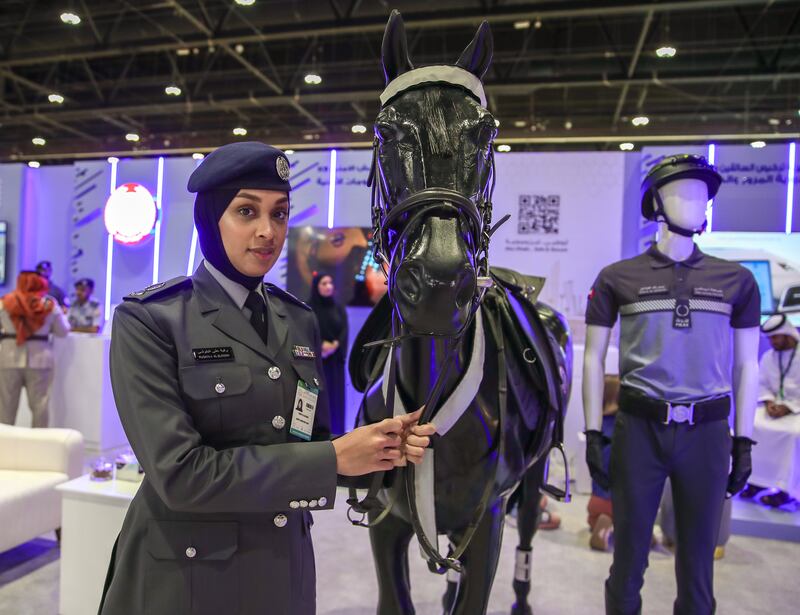 Ruqaya Alblooshi of the Emirates Arabian Horse Society poses with a horse at Adihex. Victor Besa / The National