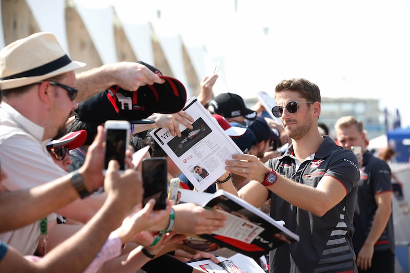 Romain Grosjean greets his fans during an exclusive autograph signing session at Yas Marina Circuit. Courtesy Yas Marina Circuit