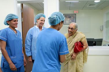Dr Zulekha Daud speaks with staff at Zulekha Hospital in Sharjah on May 8, 2014. Christopher Pike / The National







