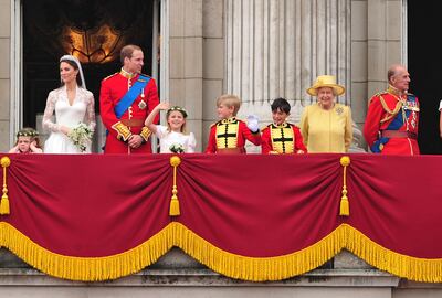 Catherine, Duchess of Cambridge, Prince William, Duke of Cambridge, Queen Elizabeth and Prince Philip, Duke of Edinburgh greet a crowd of admirers from the balcony of Buckingham Palace. Photo: FilmMagic
