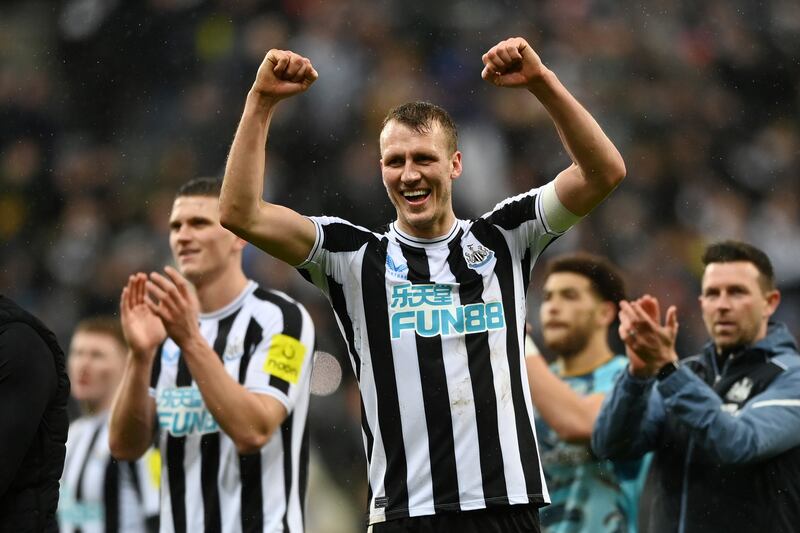 Dan Burn celebrates after Newcastle United's 2-1 League Cup semi-final second leg win against Southampton at St James' Park on January 31, 2023. Getty
