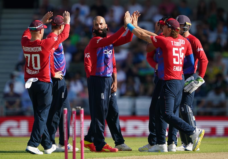 England's Moeen Ali, centre, picked up two wickets and hit a quickfire 36 to set up a thumping win over Pakistan in the second T20 in Leeds on Sunday, July 18.