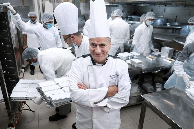 Executive chef Georges Gerayel in the kitchen as he oversees the staff at the Armed Forces Officers Club & Hotel in Abu Dhabi as the prep the food that will feed thousands daily at the Zayed Grand Mosque. Delores Johnson / The National 