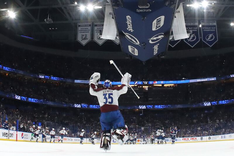 Darcy Kuemper of the Colorado Avalanche and teammates celebrate after Kadri scores a goal in overtime to defeat the Tampa Bay Lightning. AFP
