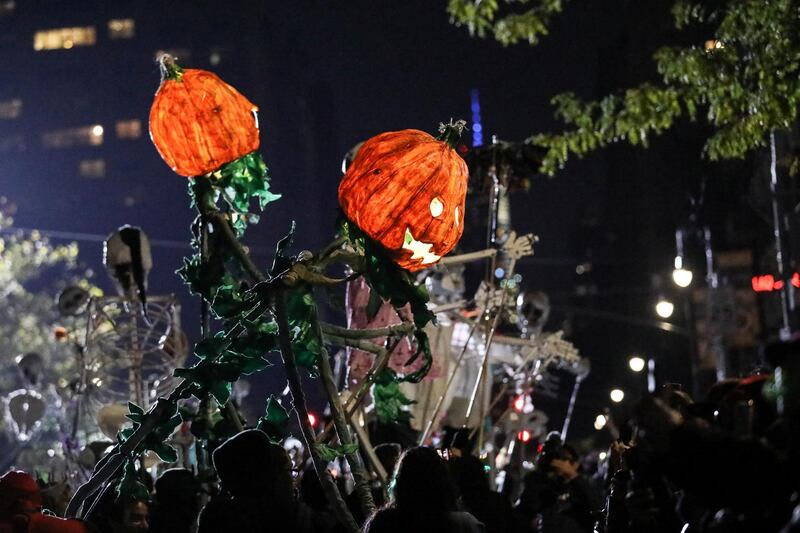 People in horror pumpkin costumes participate in the parade. Reuters