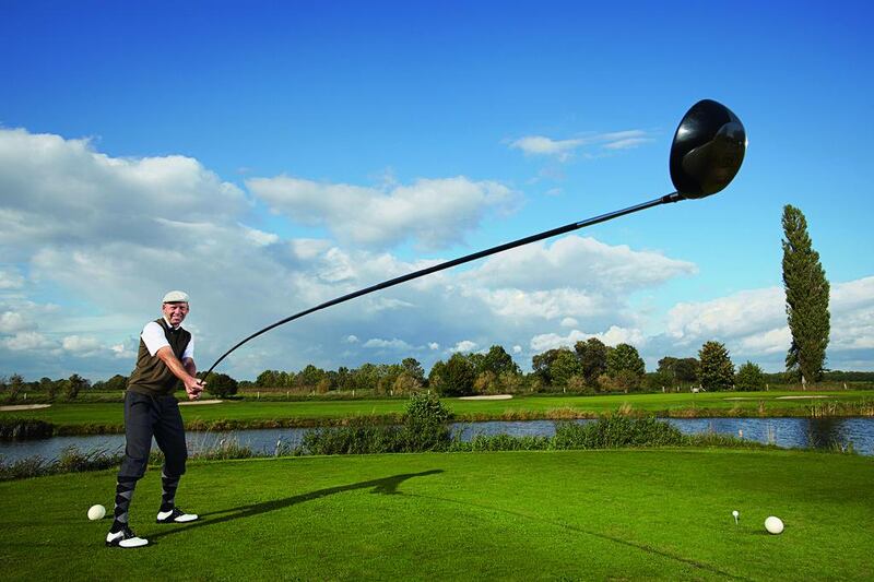 Super clubbing: Golf professional and trick-golf artist Karsten Maas, of Denmark, created the world’s longest golf club, which measures 4.37 metres long and has driven a ball 165.46 metres. Maas says that the weight and length of the club make it “exhausting” to use. “Plus, I don’t have a caddie.” Ranald Mackechnie / Guinness World Records