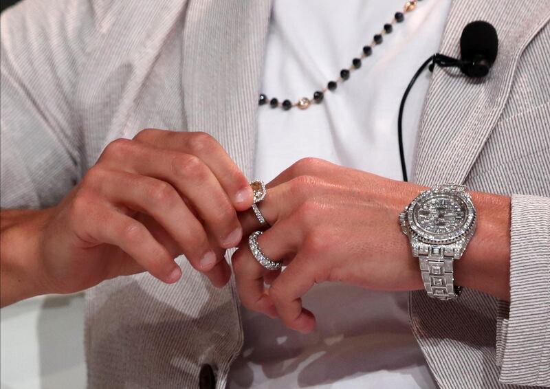 epa08092394 Portuguese international Cristiano Ronaldo of Juventus Turin sports expensive jewellery as he attends during the 14th edition of Dubai International Sports Conference in Dubai, United Arab Emirates, 28 December 2019. The conference was launched in 2006 to bring football stakeholders together.  EPA/ALI HAIDER