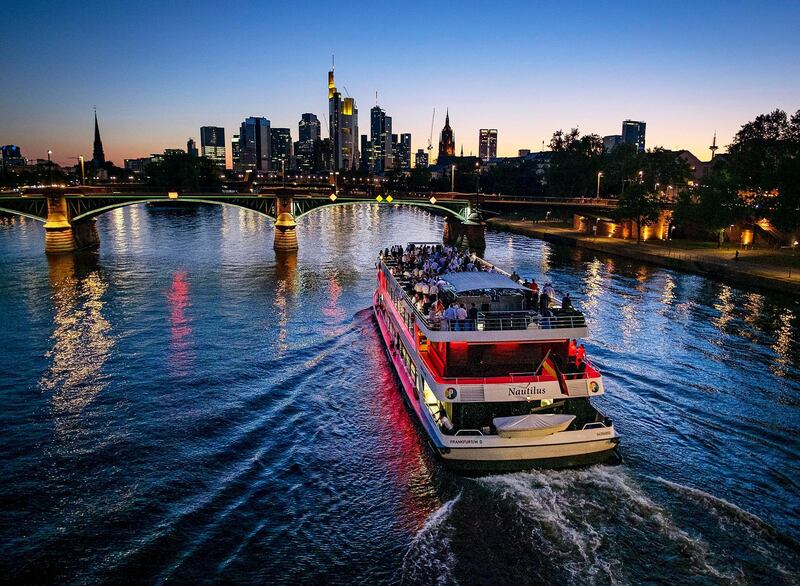 A party ship cruises over the River Main in Frankfurt, Germany. AP Photo