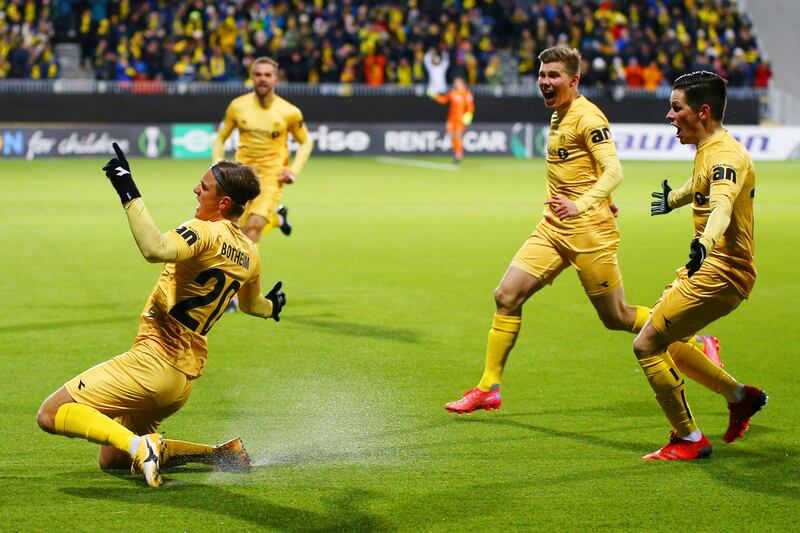 Bodo/Glimt's Erik Botheim, left, celebrates with teammates after scoring. AP