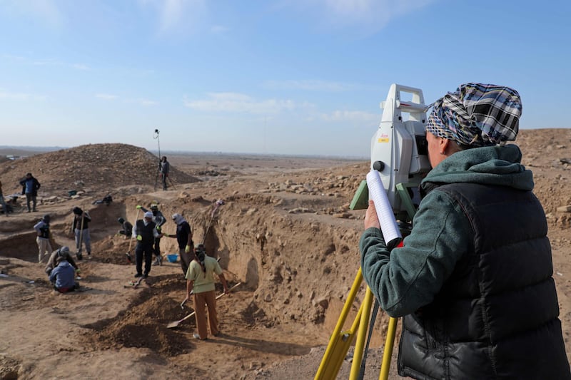 Archaeologists and workers excavate the ancient Sumerian city of Girsu. AFP