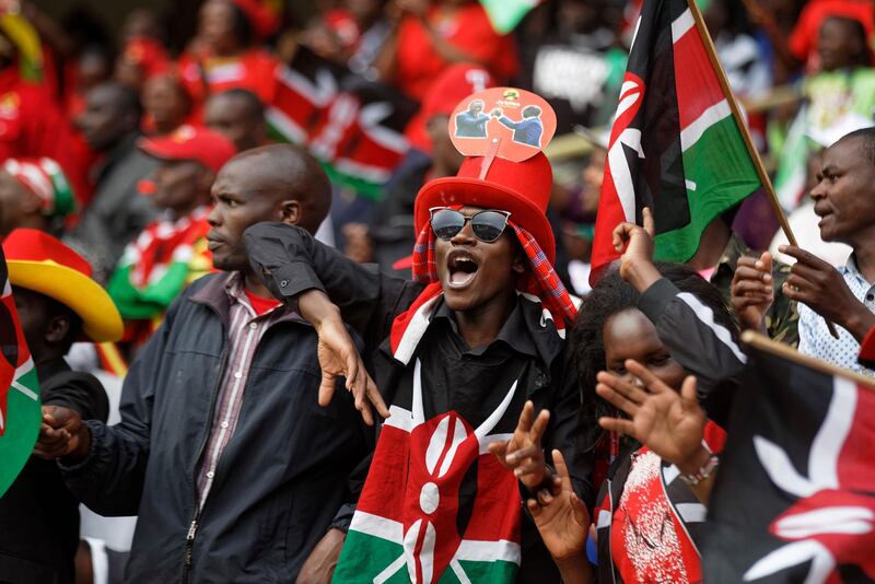 Supporters in the stand attend the presidential inauguration at Kasarani stadium in Nairobi, Kenya on Tuesday, Nov. 28, 2017. Ben Curtis / AP Photo
