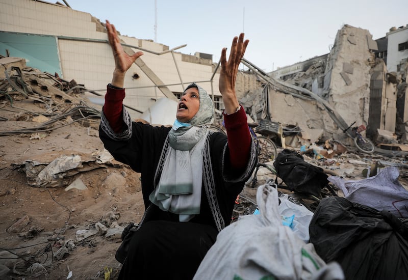 A woman reacts as she surveys the devastation at Al Shifa Hospital. Reuters