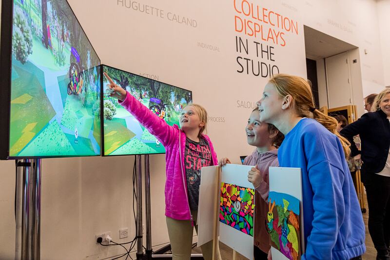 Children upload their artworks inspired by ‘The Snail’ by Henri Matisse into the digital landscape, at Tate Modern. Photo: Hydar Dewachi