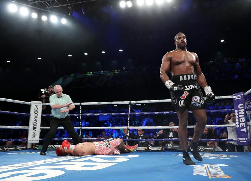 British fighter Daniel Dubois walks away after knocking out Kyotaro Fujimoto of Japan during the WBC Silver and WBO international heavyweight title fight at Copper Box Arena in London on Saturday, December 21. Getty
