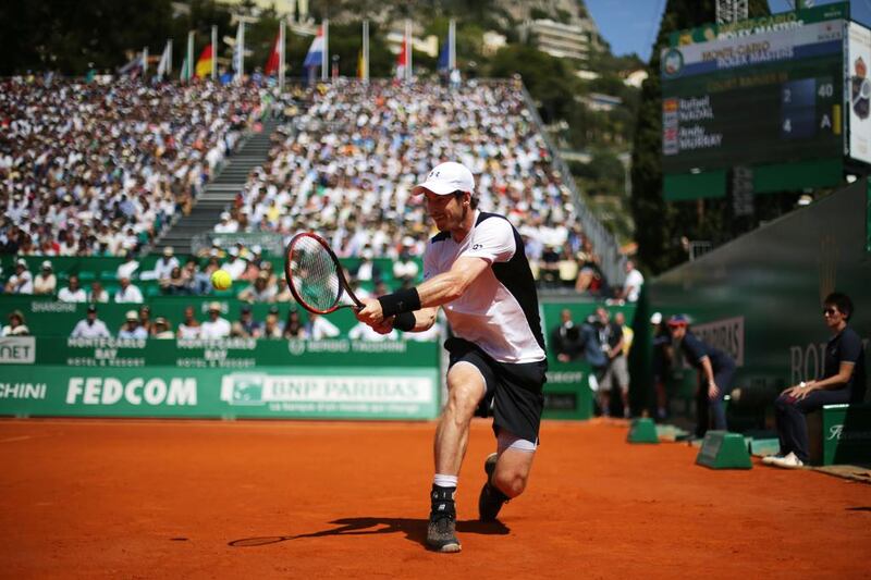 Britain’s Andy Murray retuns the ball to Spain’s Rafael Nadal in the Monte-Carlo ATP Masters Series Tournament semi-final match, on April 16, 2016 in Monaco. Nadal won the match 2-6, 6-4, 6-2. AFP PHOTO / JEAN CHRISTOPHE MAGNENET