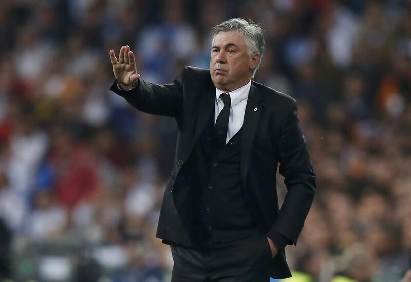 Real Madrid coach Carlo Ancelotti knows three straight wins could result in hoisting two different trophies this season. Sergio Perez / Reuters

