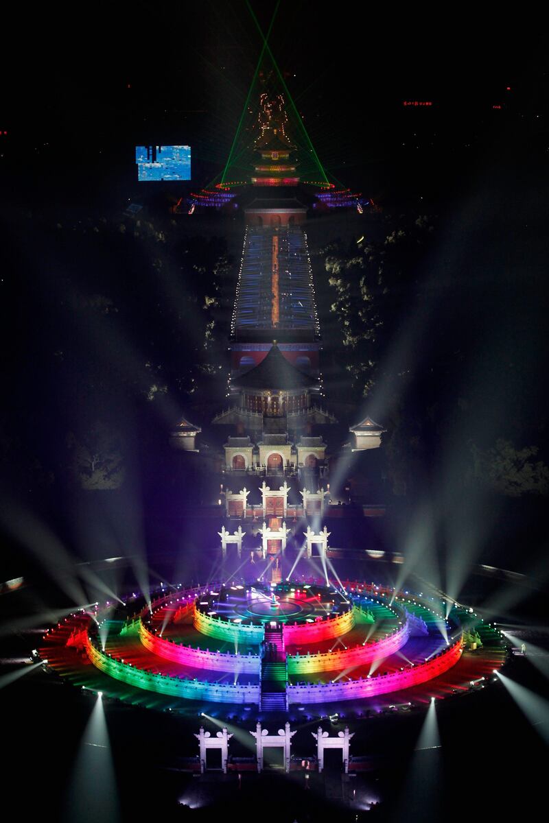 BEIJING, CHINA - DECEMBER 31:  The Circular Mound is illuminated as Beijing celebrates the New Year's Eve at the Temple of Heaven Park on December 31, 2011 in Beijing, China. The new year, 2012 begins at midnight. (Photo by Lintao Zhang/Getty Images) *** Local Caption ***  136293500.jpg