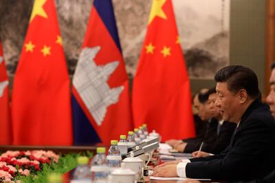 China's President Xi Jinping (R) speaks during a meeting with Cambodia's Prime Minister Hun Sen (not pictured) at the Diaoyutai state guesthouse in Beijing on January 21, 2019. / AFP / POOL / Ng Han Guan
